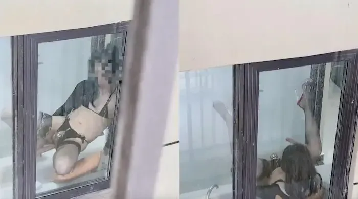 静默如海 惊呆了 竟然在过道拍到一只骚母狗在厨房做一些不可描述的事 被发现后竟然还招手问好